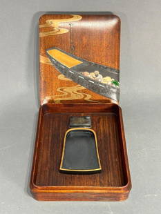 Japanese Lacquer Suzuribako, Boat Carrying Seashells: Japanese Lacquer Suzuribako, Boat Carrying Seashells, c.1850, is crafted to emphasize the beauty of materials-boxwood, ceramic, pewter and mother-of-pearl. A pewter boat filled with shells, each in re