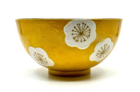 Japanese Porcelain Bowl: Kawamura Seizan: Japanese Porcelain Bowl: Kawamura Seizan (Japanese,1890-1967), is probably early 20th century in date. The main decorative motif is plum blossoms painted over a yellow ground. Gold enamel accents the