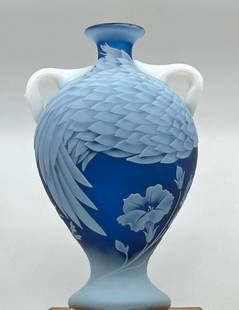 Japanese Cameo Glass Vase: Japanese Cameo Glass Vase, contemporary in date, exemplifies the complex techniques to create cameo glass. The decorative theme of birds (necks and heads suggested by white handles) are ingeniously in