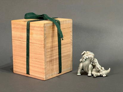 Japanese Celadon Porcelain Shi-shi Sculpture: Japanese Celadon Shi-shi Sculpture, probably late 19th-early 20th century in date, features a Shi-shi lion-- a protective, mythical symbol. Its animated pose scratching it's face portrays it as an