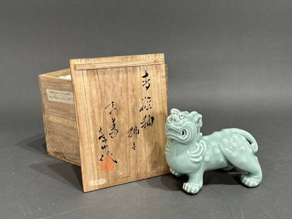 Japanese Celadon Shi-shi Sculpture by Makuzu Kozan Studio: Japanese Celadon Shi-shi Sculpture by Makuzu Kozan Studio, probably late 19th-early 20th century in date, portrays the protective lion in a humorous manner with bulging, upward looking eyes and grimac