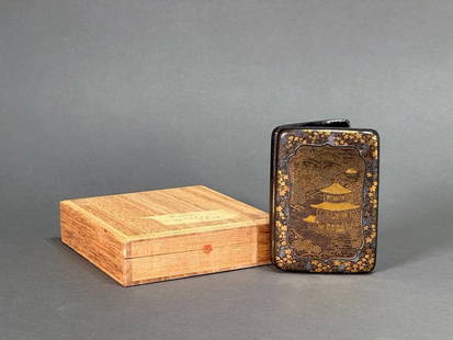 Mixed Metal Inlaid Cigarette/Card Case by Komai: Cigarette Case/Card Case by Komai, ca. 1880-90, is ornately decorated with gold and silver over an iron base. Kinkakuji, the Golden Pavilion, dominates the front design of the case. Intricately create