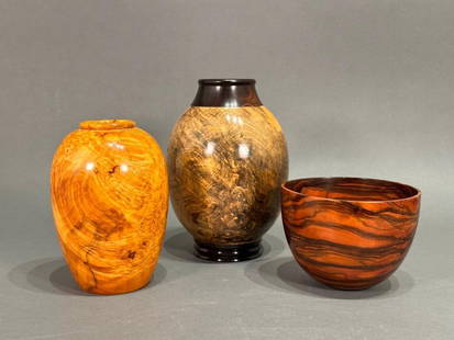 Three Exotic Wood Turned Vessels, Contemporary: Three Exotic Wood Turned Vessels, Contemporary, comprising a bulbous turned vase signed Vernon Head, a turned figured wood bowl signed with initials ' ML ' and an unsigned baluster form vase.