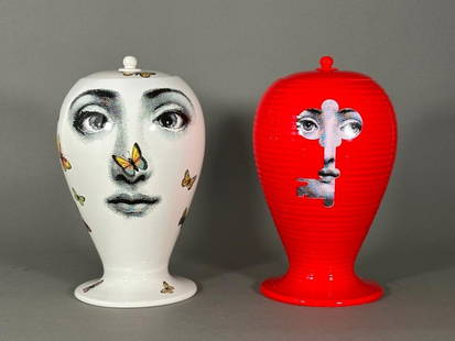 Two Fornasetti "Tema e Variazioni" Covered Vases: Two Fornasetti &#34;Tema e Variazioni&#34; Covered Vases, each baluster form tapering toward the base, on circular foot, each decorated with a variation based on the opera singer Lina Cavalieri&#39;s