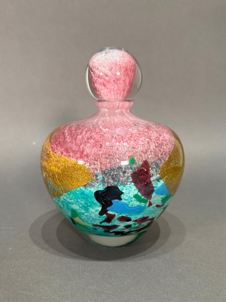Jean-Claude Navaro (French, 1943â€“2015): Art glass bottle, with removable stopper, signed. apprx 7.5"T x 5"W at shoulder. He pioneered techniques which included adding and layering unique materials directly into molten glass, such as