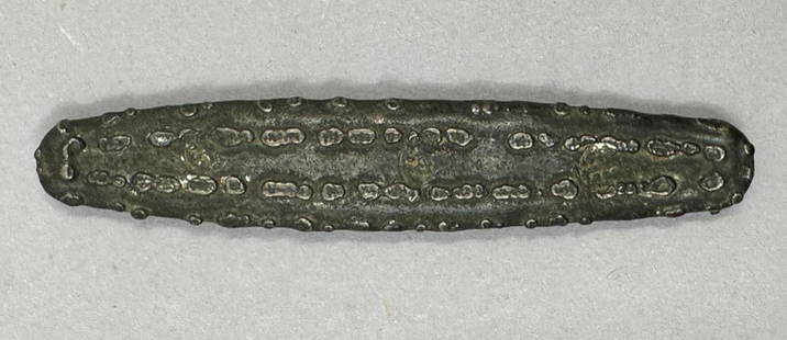 Tiger Tongue Silver Ingot, ca. 1500-1800 cen.: Tiger Tongue Silver Ingot, apprx 3"L. Apprx 59.12 grams. Hand poured silver ingot, (also called Lat money) from the ancient Lan Chang Kingdom in South-East Asia; ca. 1500-1800 cen. presently Thailand