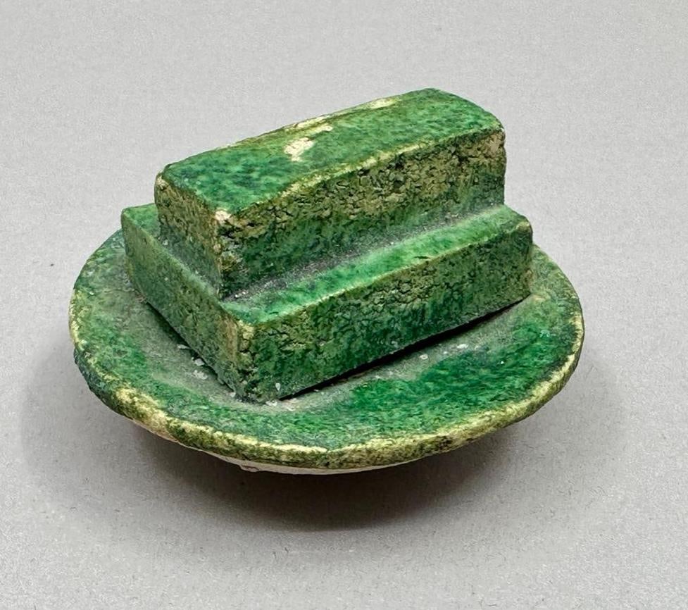 Chinese Green Glazed Ceramic Miniature Offering: Chinese Ceramic Miniature Offering, emulates offerings for shrines. The miniature was created for a home shrine honoring family ancestors and would have been accompanied with other offerings of wine a