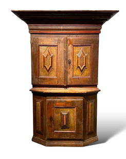 Rustic Scandinavian Painted Pine and Faux Bois Two Part Cabinet, Early 19thc.: Rustic Scandinavian Painted Pine and Faux Bois Two Part Cabinet, Early 19thc. With dramatic molded cornice over a pair of hinged doors with molded designs, opening to a fitted interior with shelves, w