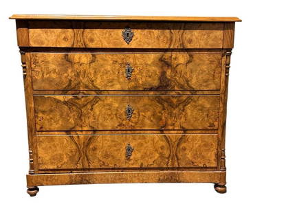 Biedermeier Burlwood Chest, 19th Century: Biedermeier Burlwood Chest, 19th Century, rectangular top over four long drawers flanked by turned pendants, raised on bun feet. Cast metal escutcheons, with one locking skelaton key.  Dimensions: 35.