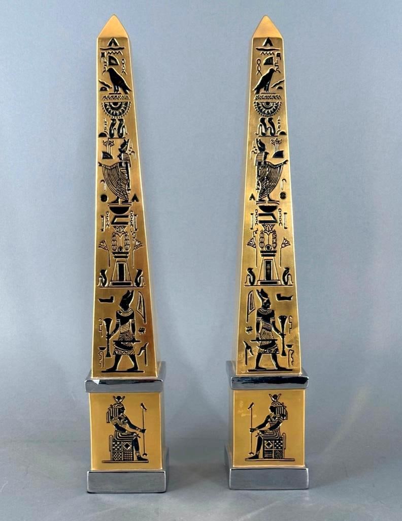 Pair of Boehm Porcelain Commemorative Obelisks, Tutankhamun: Pair of Boehm Porcelain Commemorative Obelisks, inspired by the exhibition Treasures of Tutankhamun, 1976-1979, numbered 43 A and B. Dimensions: 18 in.h. Condition: One obelisk with repaired chip at l