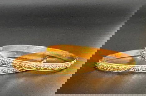 Pair of 18K Antique Gold Bangles: Pair of 18K Antique Gold Bangles, Art Nouveau design of leaves on a vine with fruit, identical bangles, apprx 21.06 grams total. Hallmarked 18K on both interiors. Apprx 2.5"D each. From the collection