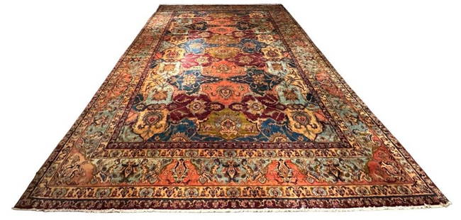 Large Persain Carpet 19'5" x 12'4": Medium pile wool on cotton weft, primary ground color medium plum with dark teal, light blue, salmon and cream. Teal corner guards, large branching flowers and multiple borders. Apprx 19'5" x