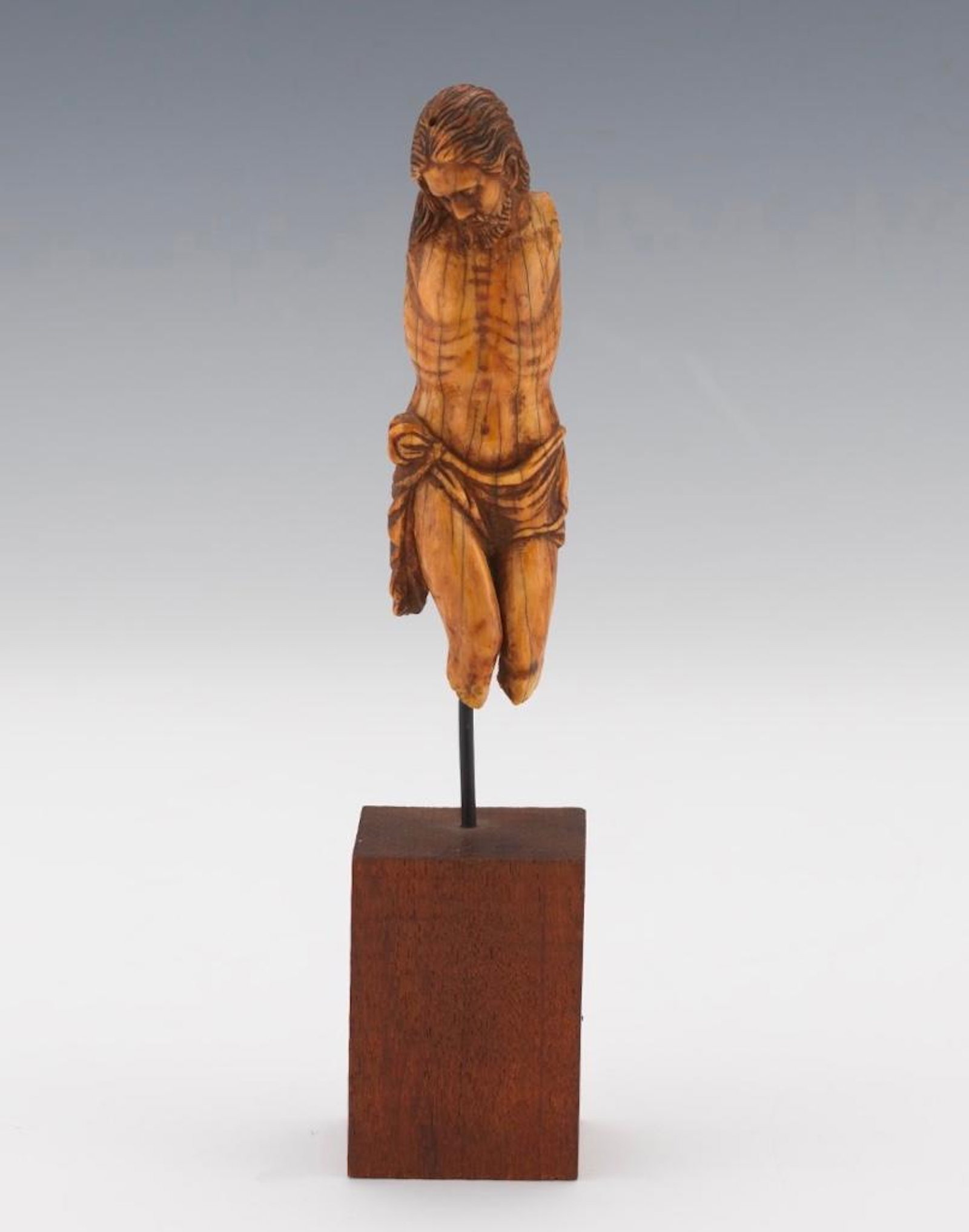 Antique Carved Walrus Tusk Corpus Christi, ca. 15th/16th C: Antique Carved Walrus Tusk Corpus Christi, 15th/16thc. Partial figure in carved and stained bone, raised on rod and pedestal base. Dimensions: 4.5 in. h. of figure only, 7.5 in.h. including base. Cond