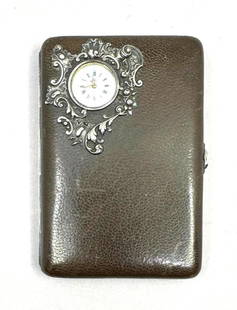 Victorian Ladies Leather Calling Card Case with Timepiece, Aide Memoire: Victorian Ladies Leather Calling Card Case with Timepiece or Aide-Memoire, hinged brown leather covered case, the cover inset with an enamel dial timepiece with enameled numerals, with a silver