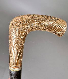 Antique Gold Filled Handled Walking Stick: Antique Gold Filled Handled Walking Stick, the L-shaped gold handle chased with flowers and leaves, with an engraved commemorative cartouche engraved " From employees to James Ferrell...." on a