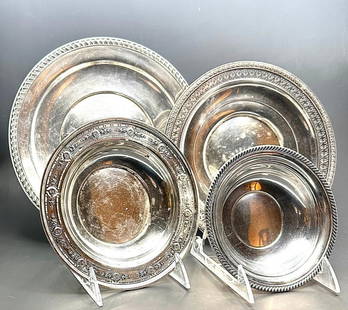 Three Sterling Silver Serving Trays and Gorham Bowl: American sterling silver, smallest is a shallow bowl by Gorham, another identified as International Sterling. Each a different design and size, the largest is a 10"D.  Dimensions: largest is 10"D. Sma