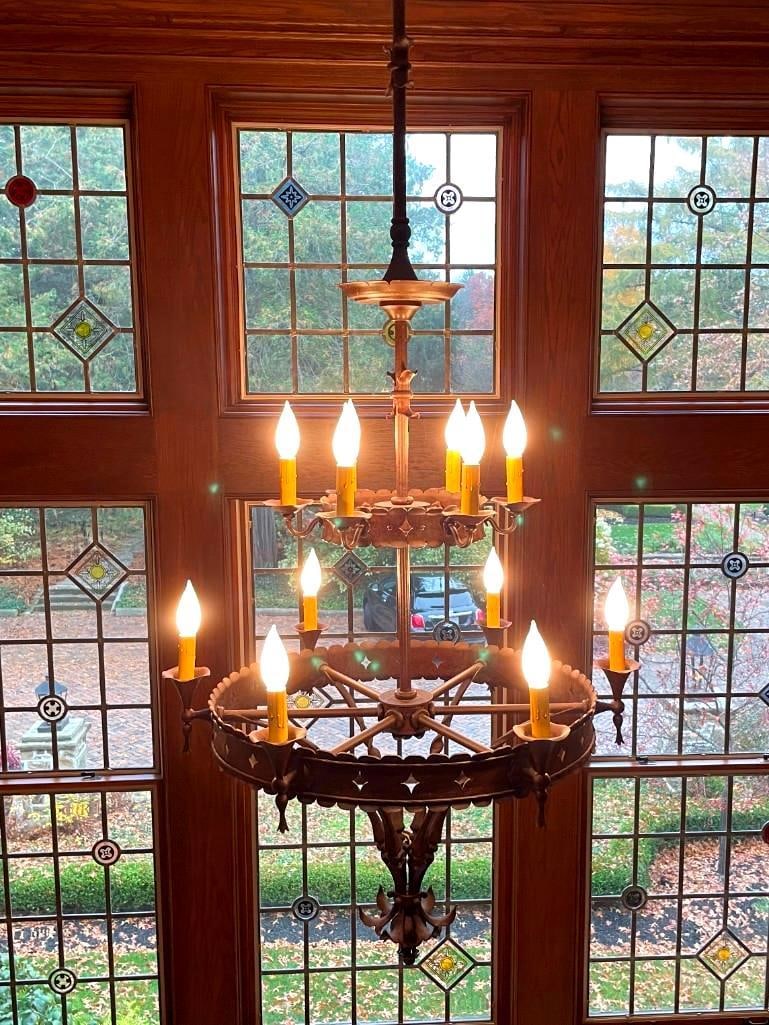 Monumental Rose Iron Works Chandelier: Monumental Custom Rose Iron Works Chandelier, contemporary, made in Cleveland, Ohio, c.1990's, of concentric graduated ring design with cut outs and baluster, twist and floral elements. Dimensions