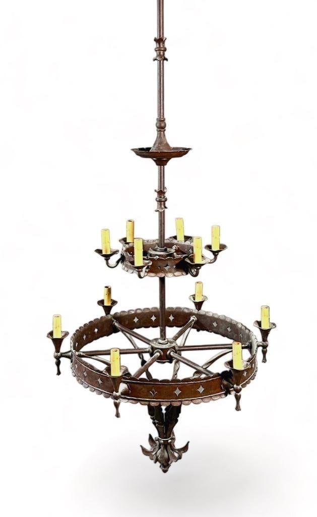 Rose Iron Works Chandelier: Custom Rose Iron Works Chandelier, contemporary, made in Cleveland, Ohio, c.1990's, of concentric graduated ring design with cut outs and baluster, twist and floral elements. Dimensions: Approxima