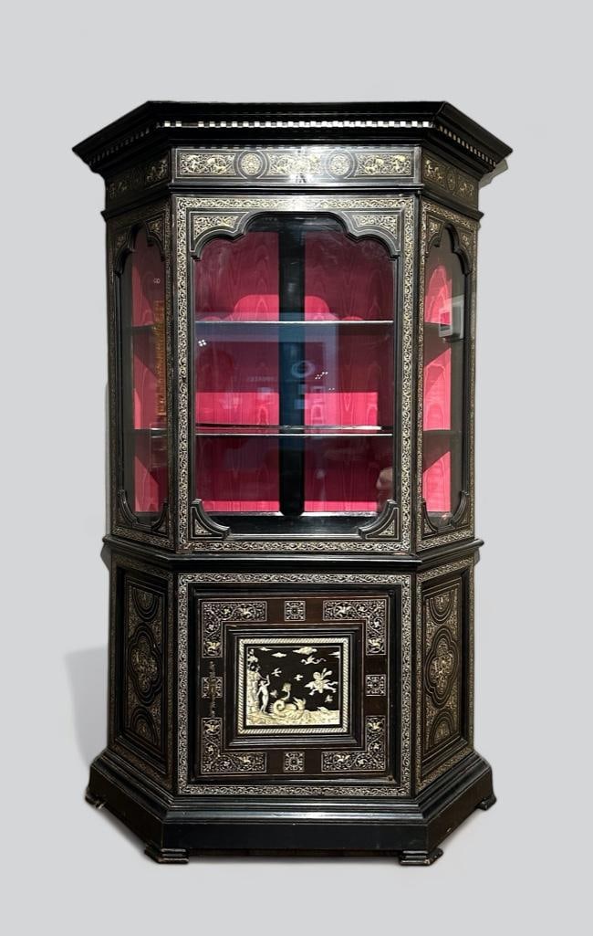 Milanese Bone Inlaid Ebonized Vitrine Cabinet: Milanese Bone Inlaid Ebonized Vitrine Cabinet, 19thc. With dentil molded cornice over a frieze panel inlaid with hunt scenes in scrolling vines, over glazed side panels and center door, opening to she