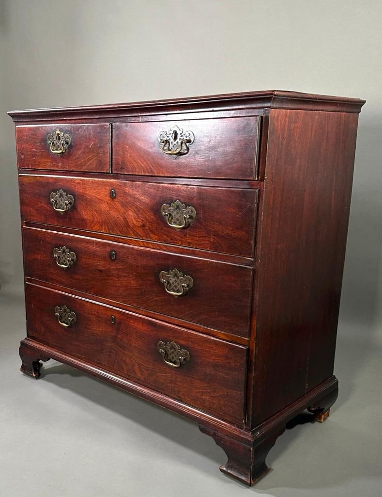 English Georgian Mahogany Chest of Drawers: English Georgian Mahogany Chest of Drawers, 18thc. The rectangular molded top over two short and three graduated long drawers, all with locks, with 1 key, raised on bracket base. Dimensions: 42 in.h. 