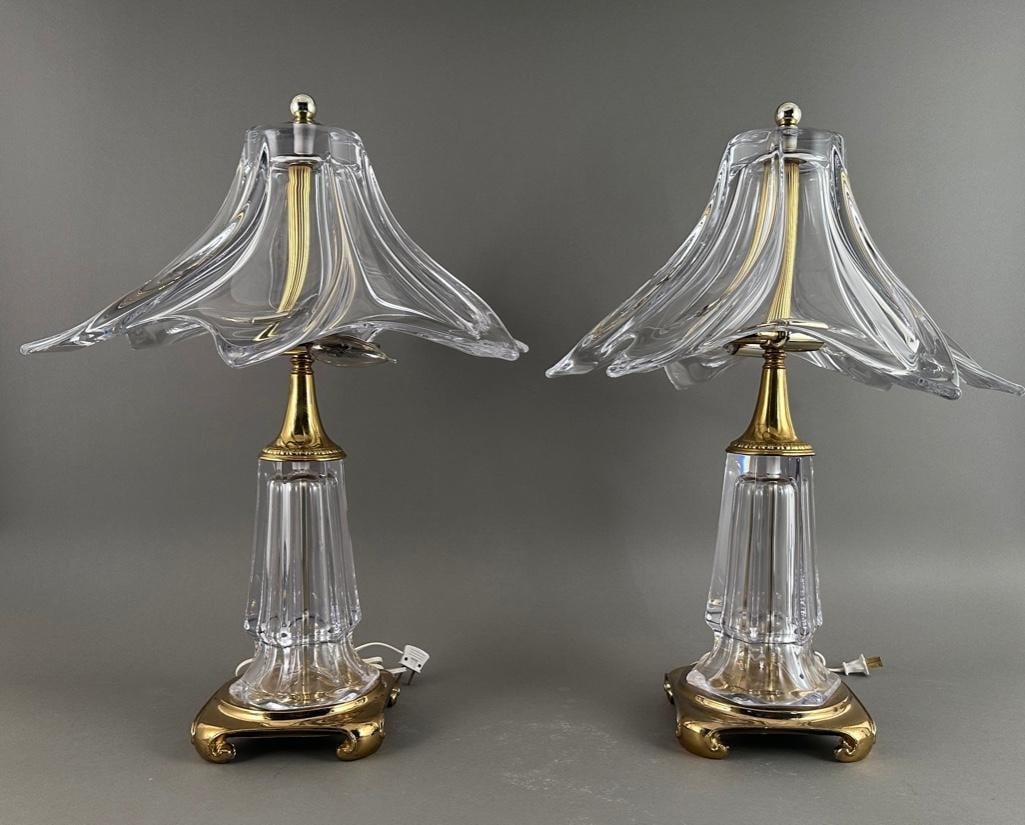Pair of Cofrac Art Verrier Glass Lamps: Pair of Cofrac Art Verrier Glass Lamps, clear crystal lamps with brass toned metal fittings, with floriform clear crystal shades and Chinese inspired bases. 24.5 in.h. x 20 in., dia. of shade Conditio