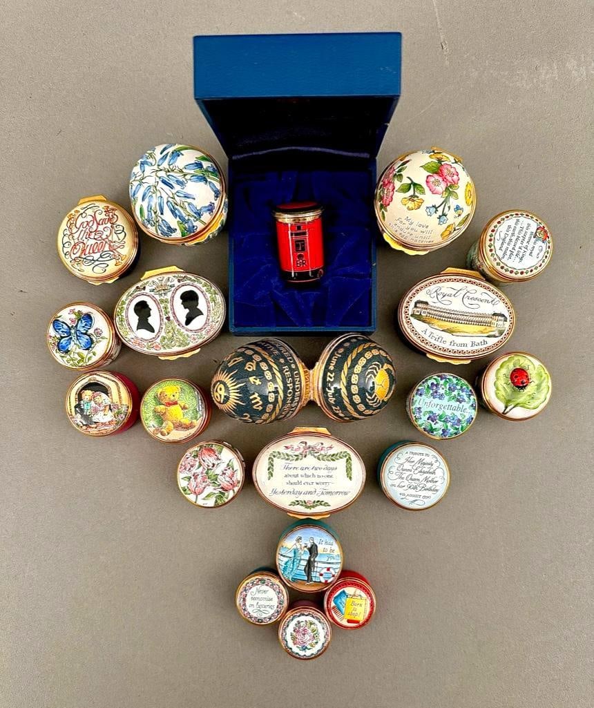 Twenty Halcyon Days Enamel Snuffboxes and Pill Boxes: Twenty Halcyon Days Enamel Snuffboxes and Pill Boxes, various subjects and forms. Dimensions: 2.5 in. and under. Condition: From Me to You with love(in box) with chips, Prince of Wales and Diana Box l