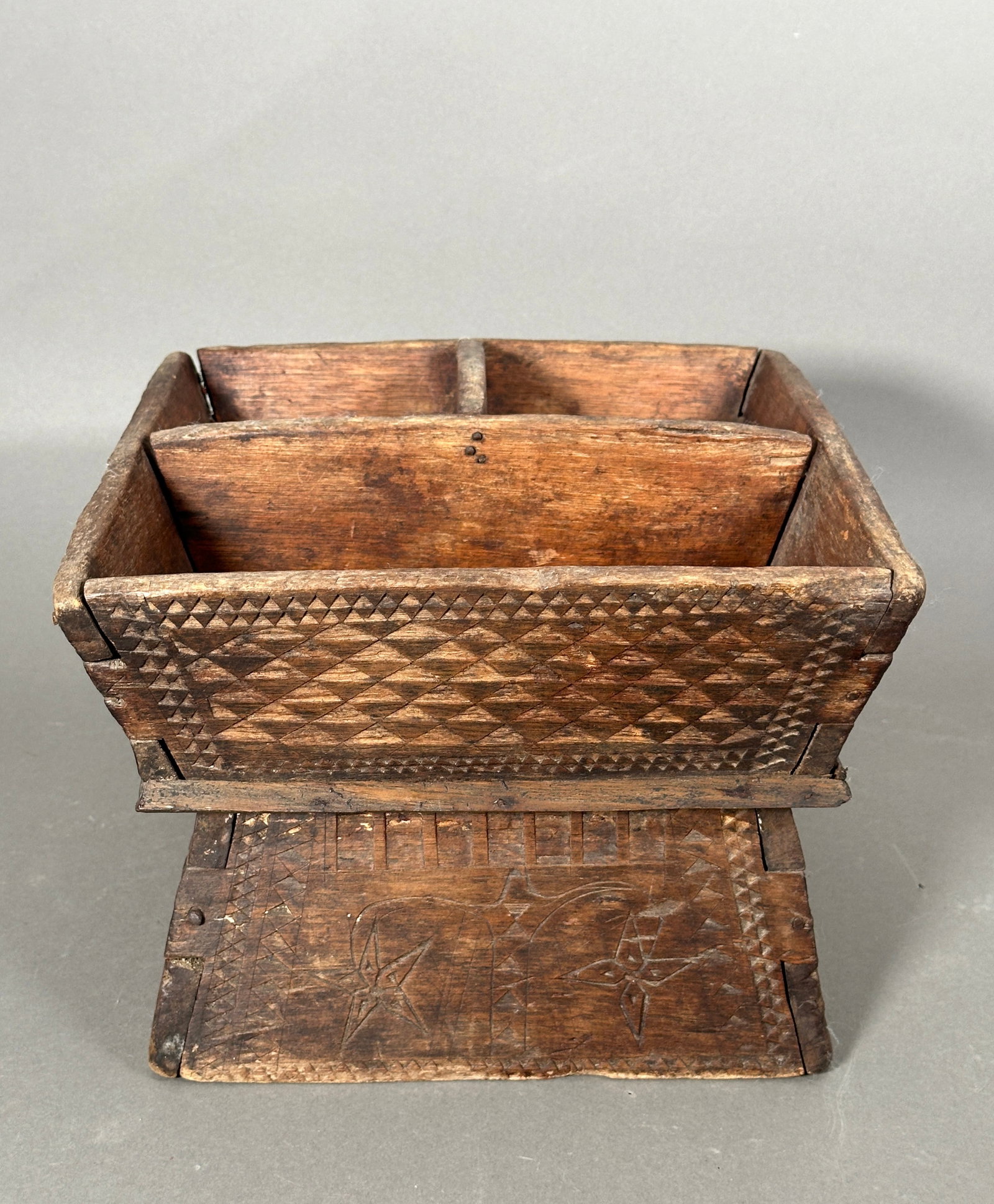 Betel Nut Box: Carved wood Betel Nut preparation box, having three compartments, raised on a hollow base, carved throughout. Betel nut chewing is firmly embedded in the traditions of South-East Asia, for social affa