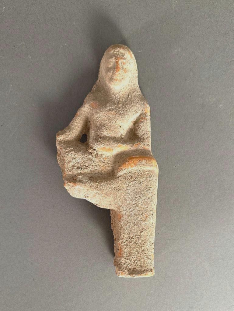 Greek Teracotta Relief of a Banqueter, Tarentum, 6th-5thc. BC: Greek Terracotta Relief of a Banqueter, South Italian, Tarentum, 6th-5thc. BC. The figure partially reclining on a couch, holding a phiale libation bowl. Dimensions: 7.5 x 3.5 in. Condition: Very good