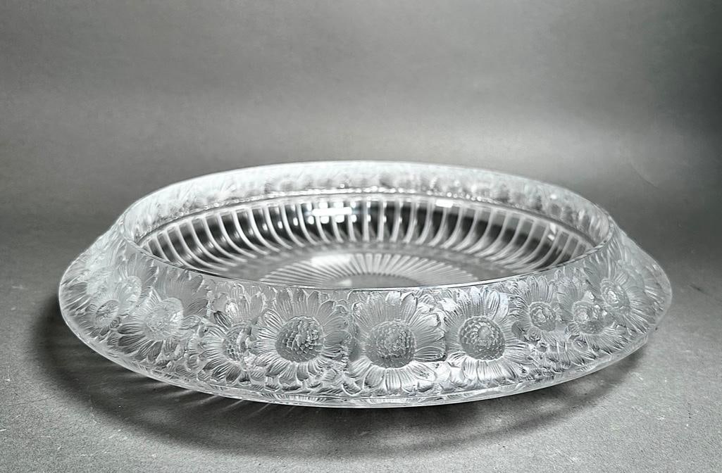 Lalique Molded and Frosted Glass Center Bowl, Marguerites: Lalique Molded and Frosted Glass Center Bowl, Marguerites, low wide form with downswept rim in clear glass molded and frosted with a pattern of daisies. Incised signature Lalique France. Dimensions: 1