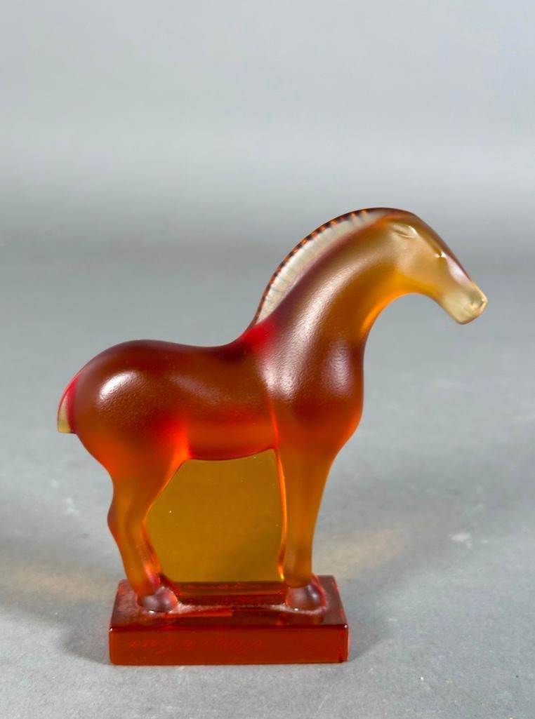 Lalique Amber Glass Tang Horse Paperweight: Lalique Amber Glass Tang Horse Paperweight, molded and frosted glass figure in amber, modeled after Chinese pottery horse figures of the Tang Dynasty. Incised signature Lalique France. Dimensions: 3.5