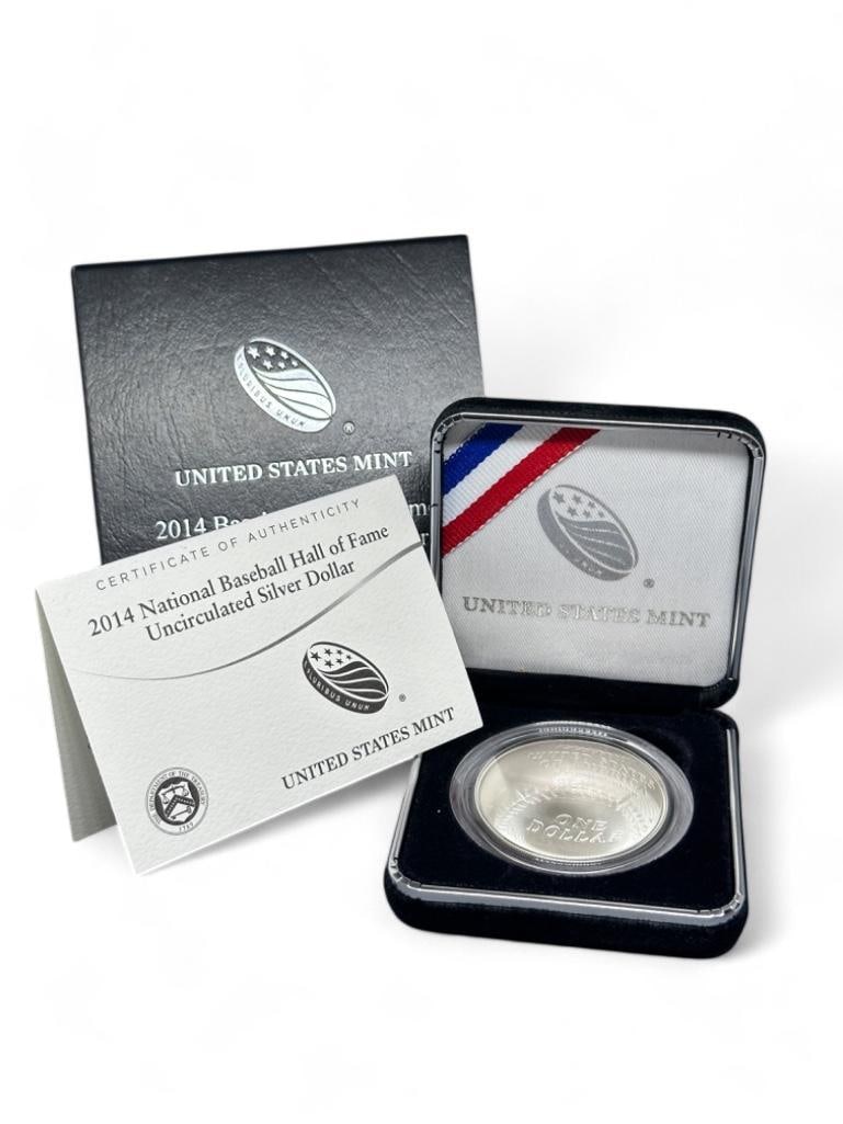 2014 Silver baseball $1 US Coin: Original packaging, silver $1 convex coin, baseball obverse, glove reverse. Offered in clam shell case, coin in hard plastic case.