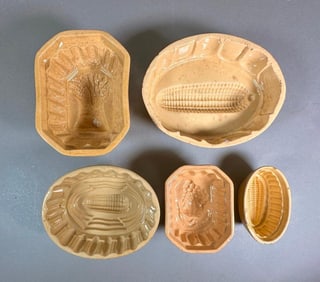Five Assorted Yellow Ware Food Molds