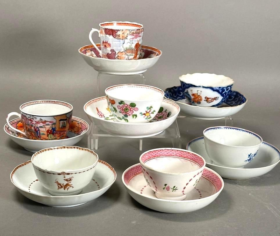 Seven Chinese Export Teabowls and Saucers, 19thc.: Seven Chinese Export Teabowls and Saucers, 19thc. Matching sets in various palettes and patterns. Dimensions: 5.25 in. average saucer dia. Condition: Some light wear to glazes, blue border saucer with