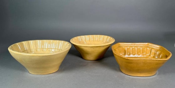 Three Yellow Ware Food Molds