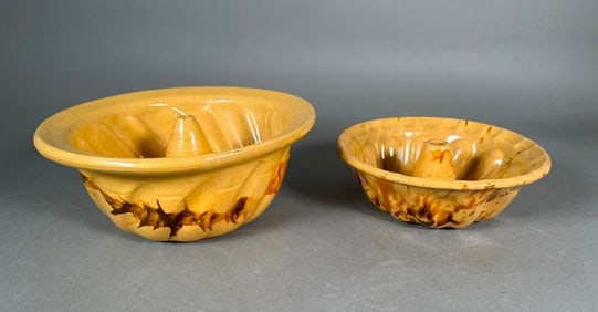 Two Yellow Ware Bundt Pans