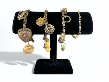 Four Vintage Charm Bracelets