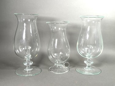 Three Blown Glass Hurricanes