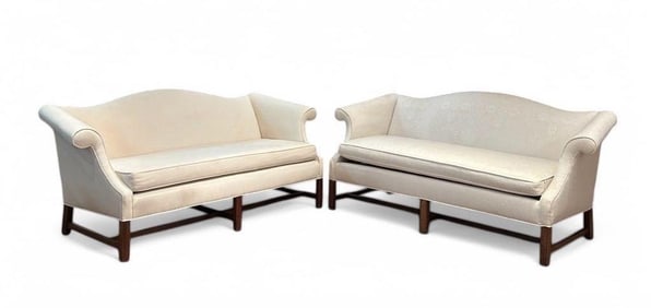 A Pair of Chippendale Style Camelback Upholstered Sofas