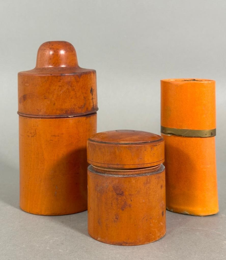 Smoking and Drinking Accessories: On the Go Smoking and Drinking Accessories, including a turned wood match safe, turned wood cocktail shaker holder, and an Owl Products Essence of Vermouth and Lemon in case. Dimensions: Approximately