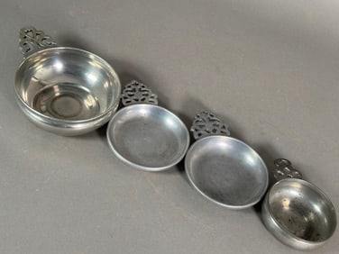 Four Pewter Porringers
