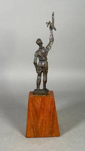 Chaim Gross Bronze, The Torch of Learning: Chaim Gross (Ukrainian 1904-1991) The Torch of Learning, bronze with brown patination, signed to the base, presentation piece from the Henrew University of Jerusalem, September 6, 1978, mounted on woo