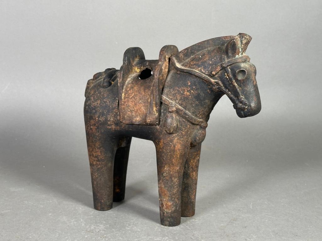 Japanese Haniwa Style Iron Censer in the Form of a Horse: Japanese Haniwa Style Iron Censer in the Form of a Horse, stylized horse form with removable saddle, with multicolored patination. Dimensions: 8.75 in.h. x 8 in.l. Condition: Very good.