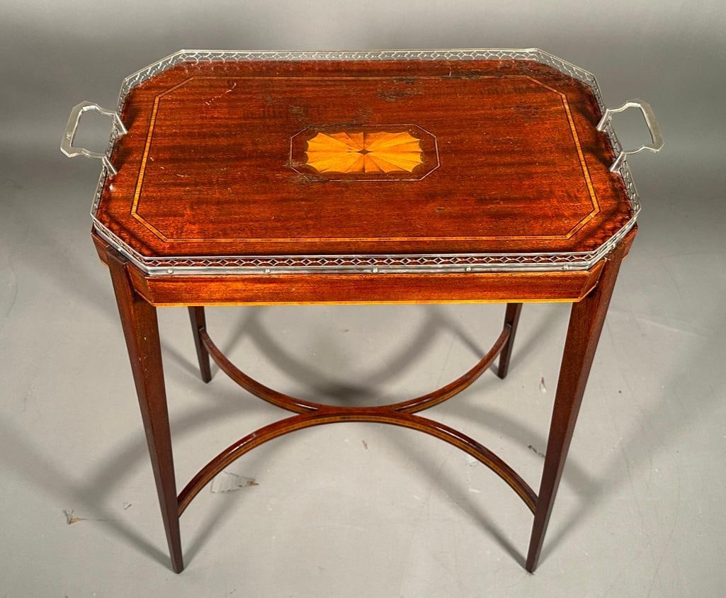 Edwardian Inlaid Wood Tray on Stand : Edwardian Inlaid Wood Tray on Stand, the rectangular tray with silvered metal gallery centering fan inlay, on later fitted stand with squared tapering legs joined by stretchers. Dimensions:Â 27 x 2