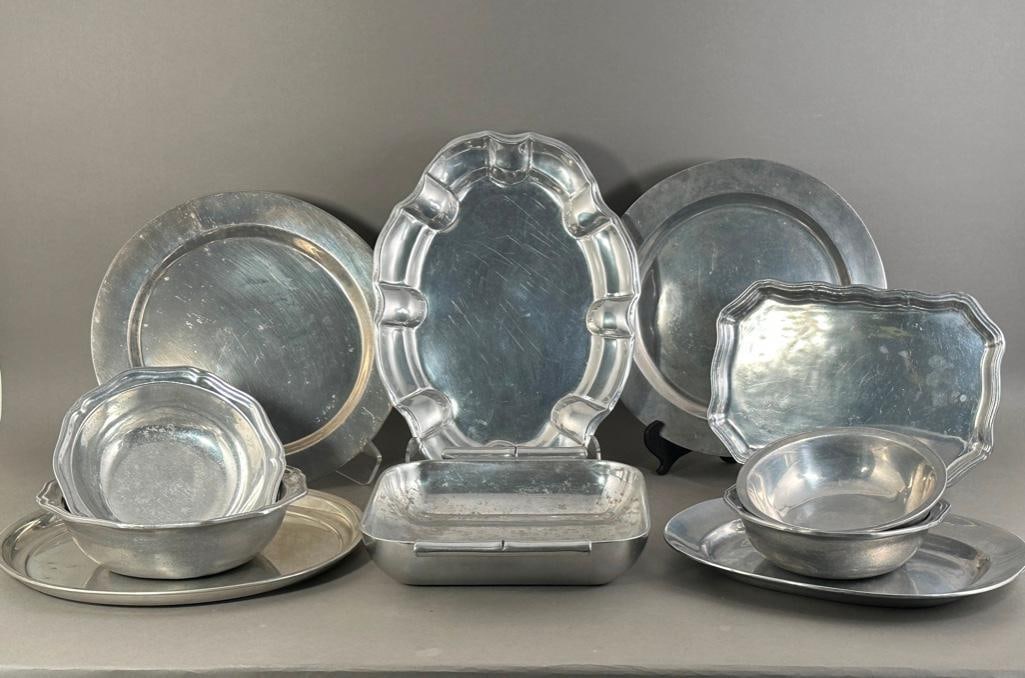 Large Lot of Aluminum Serveware: Large Lot of Aluminum Serveware, Wilton Columbia and others, 10 assorted pieces including bowls, trays, serving dishes and platters. Dimensions: Average size 16 in. w. or dia. Condition: Wear from nor