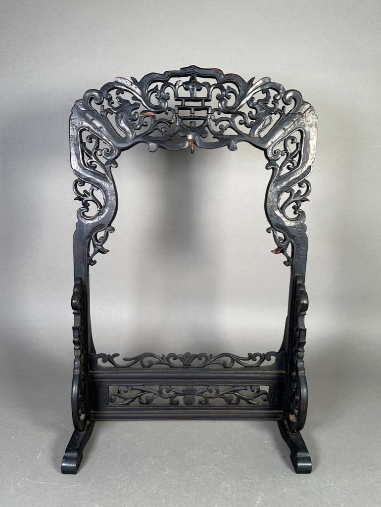 Chinese Carved Wood Gong Stand: Chinese Carved Wood Gong Stand, Pierce carved standÂ in ebonized wood. With a non-associated mallet.Â Dimensions: 20 x 13 x 7 in. Condition: Breaks in wood at top.
