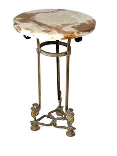 French Brass and Onyx Gueridon Table: French Brass and Onyx Gueridon Table, Early 20thc. Circular onyx top on scrolled tripod base joined by a circular band cast with a Greek key pattern, resting on winged griffin supports and bun feet. D