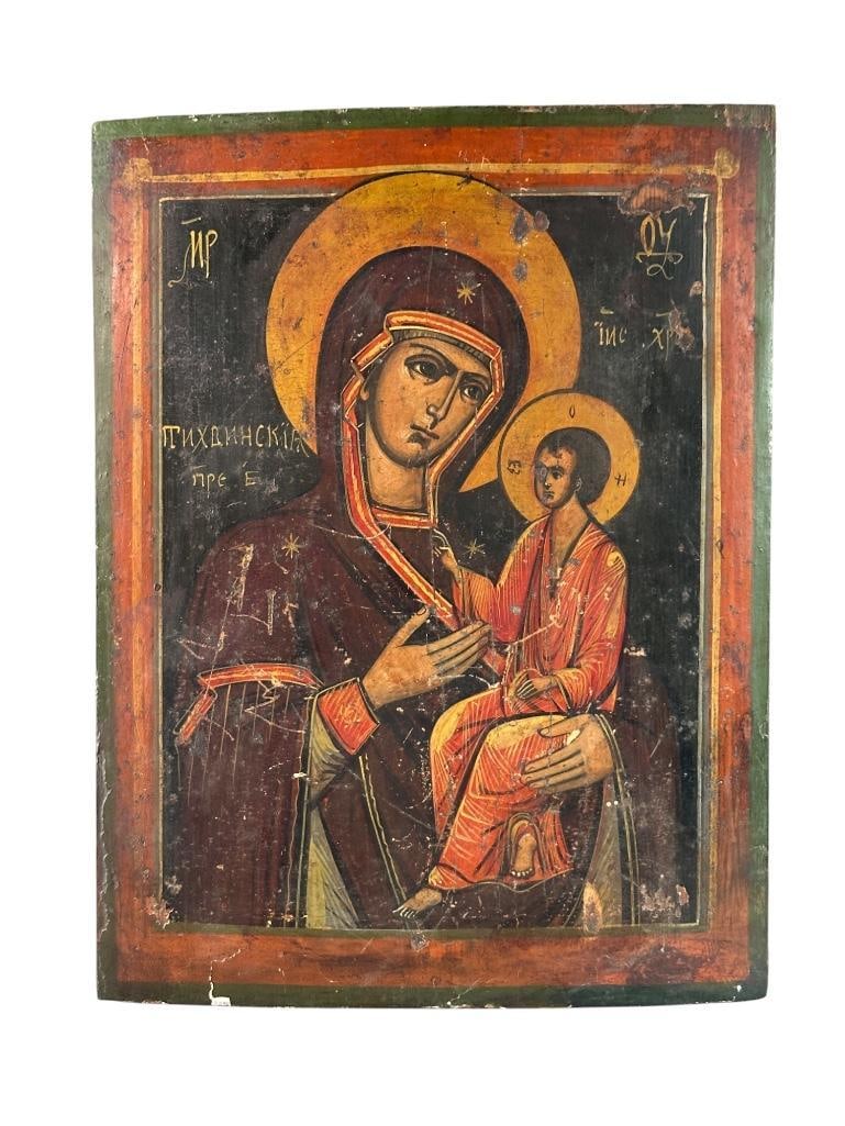 Russian Orthodox Tikhvin Icon, 19th century: Tempera on wood panel, inscribed in the Church Slavonic, translating to "Of Tikhvin" and "Most Pure", relating to the Virgin Mother. This is in the Hodegetria Style, this is one of the more revered ic