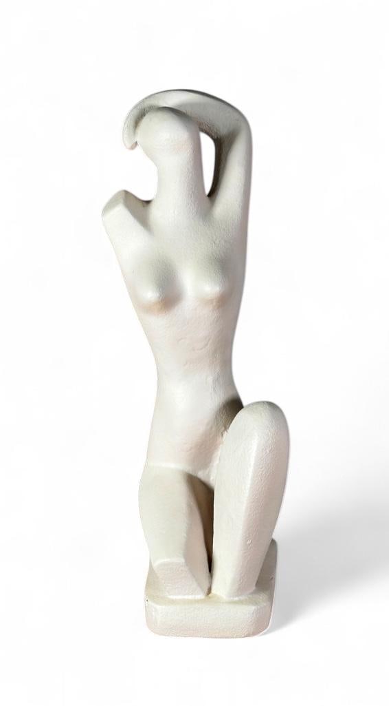 Modern Plaster Figure of a Seated Nude: Modern Plaster Figure of a Seated Nude, Stylized seated nude with truncated limbs, on rectangular base, with off white textured finish. Unsigned. Dimensions: 19 in.h. Condition: Very good with no dama