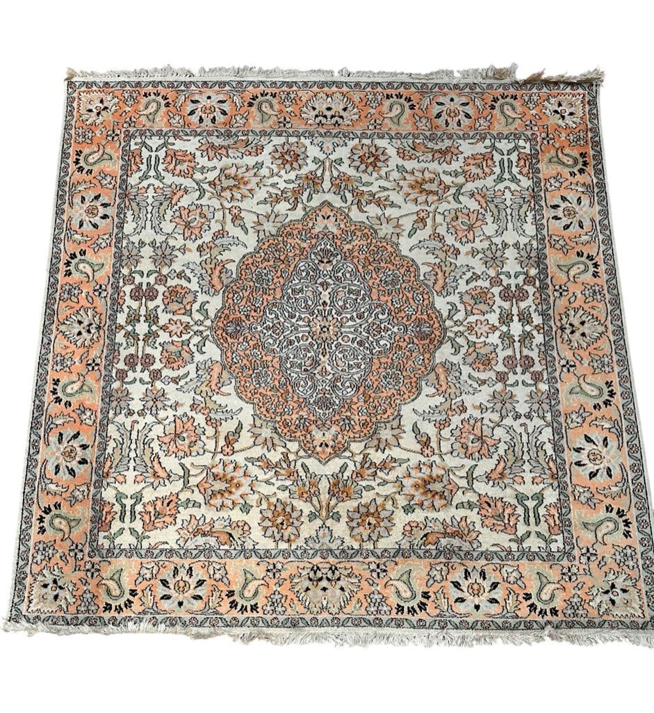 Persian Woven Carpet, 6' x 5'11": Persian Woven Carpet, squared carpet with oval center medallion in peach and cream with peach and pale green colored floral vine borders. Dimensions: 6' x 5'11"
