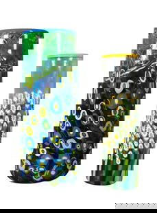 Two Mad Art Studios Art Glass Vases: Two Mad Art Studios Art Glass Vases, by Michael Maddy and Rina Fehrensen, cylindrical forms, each colorfully decorated with millefiori canes, the larger resembling peacock feathers, the smaller with d